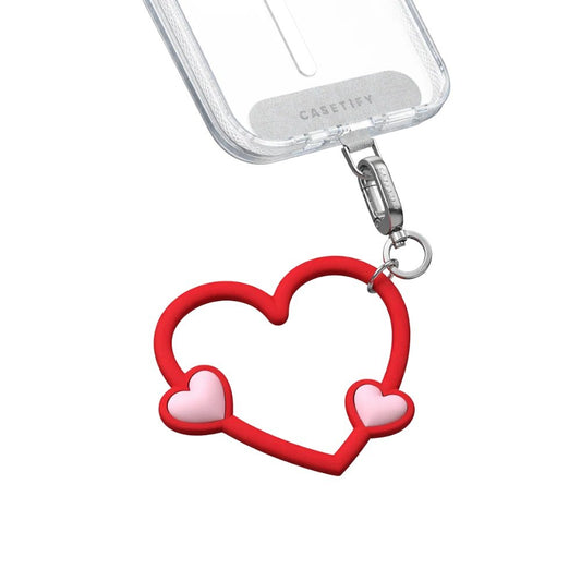 Accesorio Casetify strap de mano corazon rojo