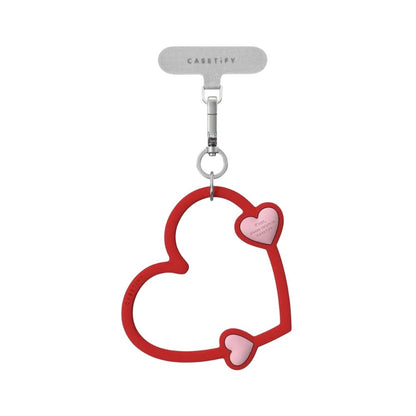 Accesorio Casetify strap de mano corazon rojo