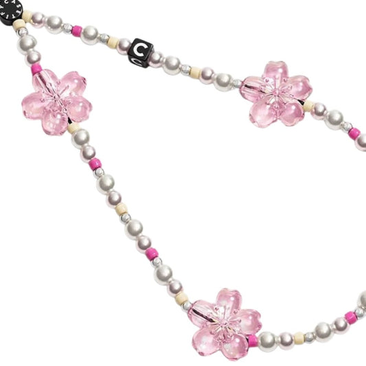 Accesorio Casetify strap de mano Sakura Pearl Pink